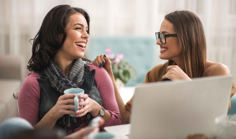 two women smiling