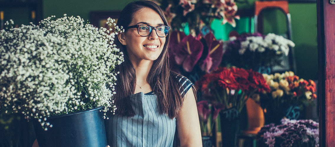 Young business owner in flower shop