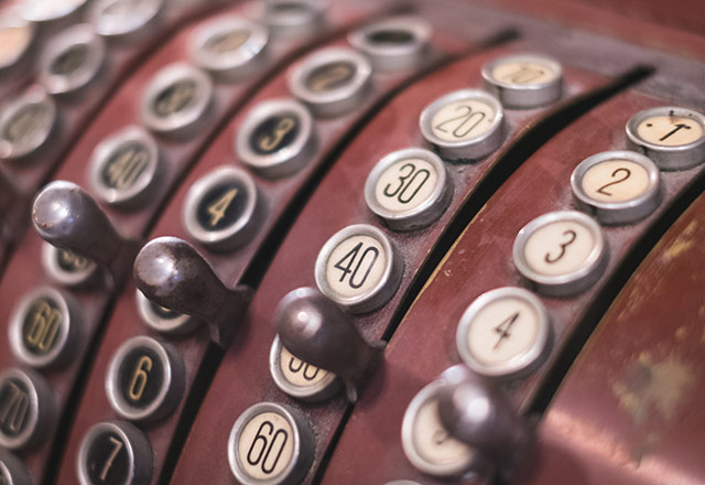 Close up of old cash register