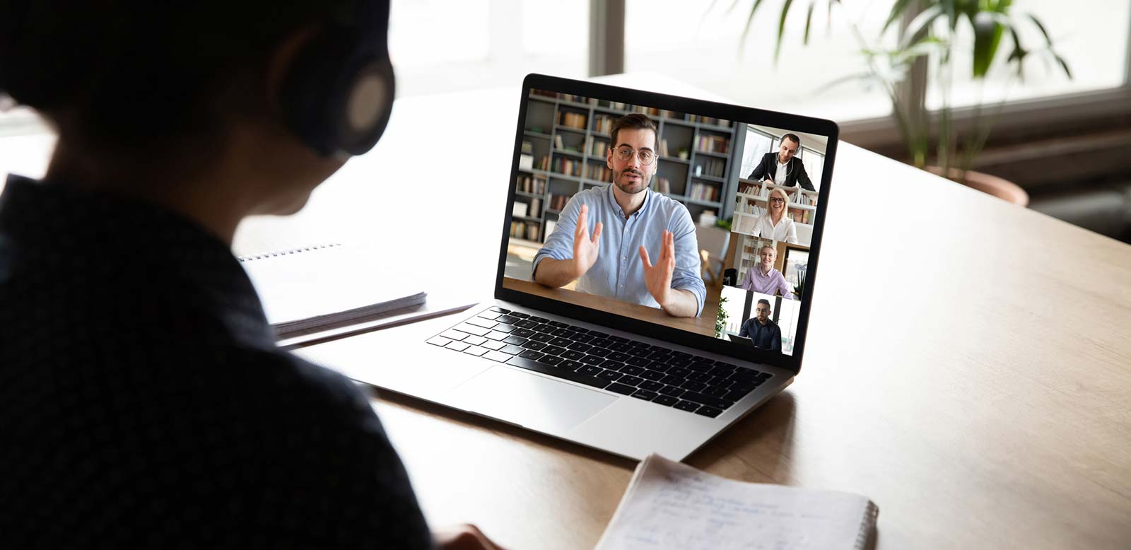 Man watching a virtual meeting