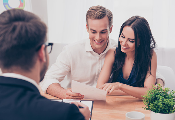 a couple reviewing a document